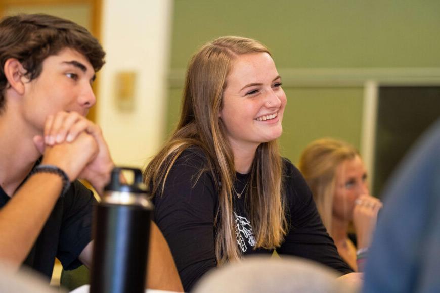 happy college students in class